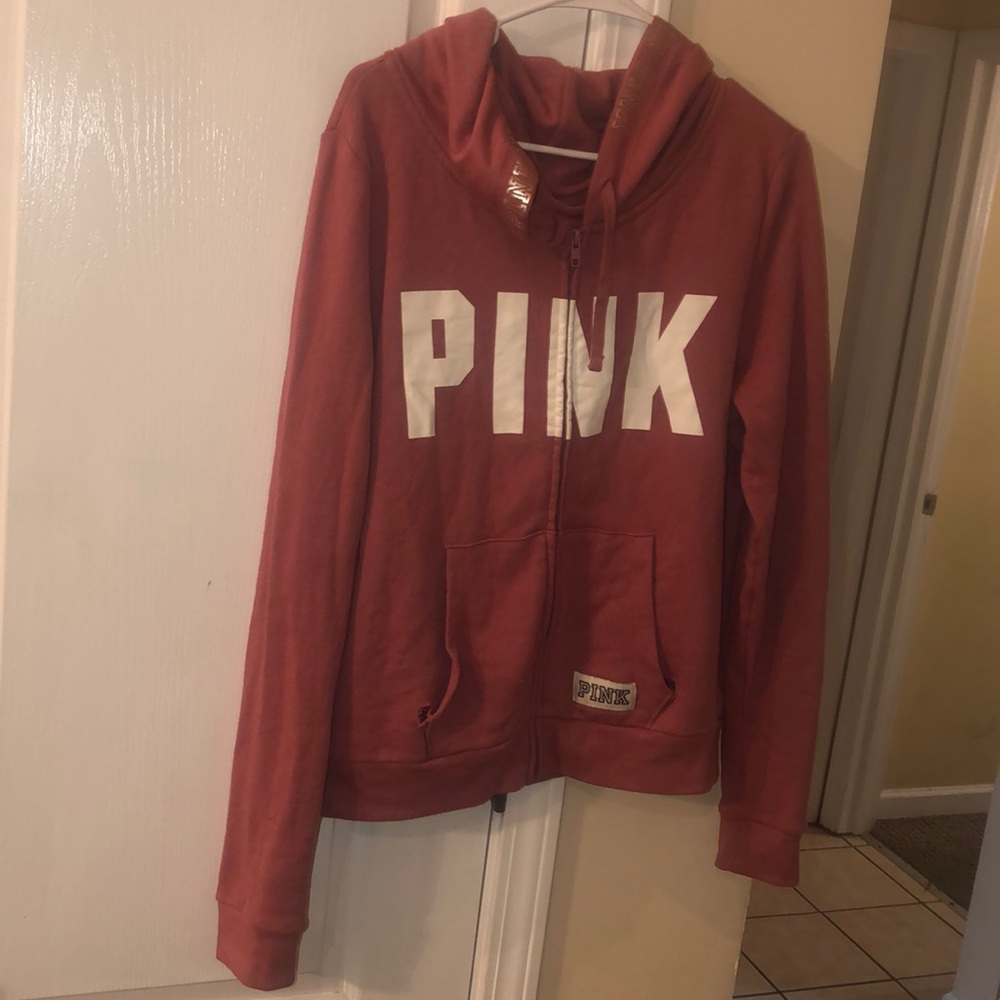 PINK jacket (HAS SMALL HOLE IN POCKET AREA)
